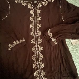 Cowgirl Tuff Rich Dark Brown top with ivory color. Kind of a “crepe” material